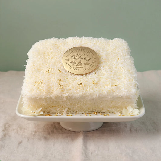 Maria Paz Cheesecake, handcrafted with rich cheese cream,  perfectly balanced sweetness and a velvety finish by PuffyClouds Cakes in Kochi.